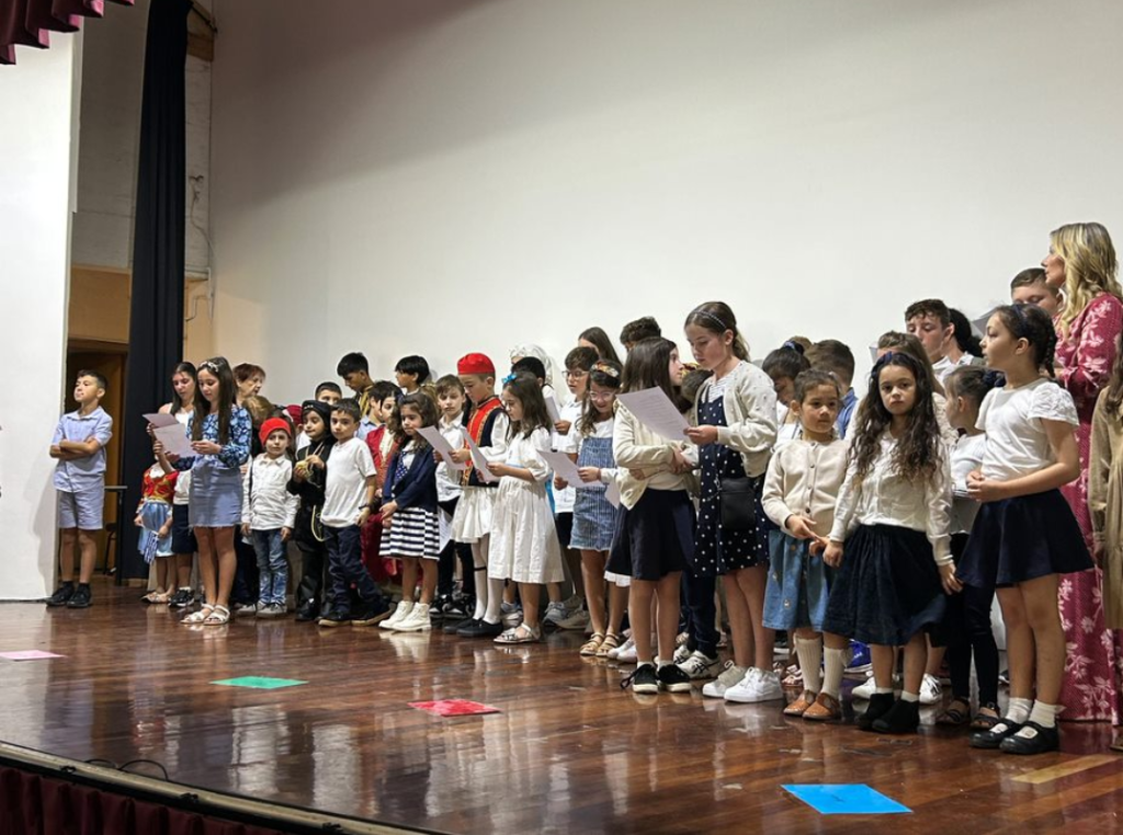 Greek school children reciting more poems.