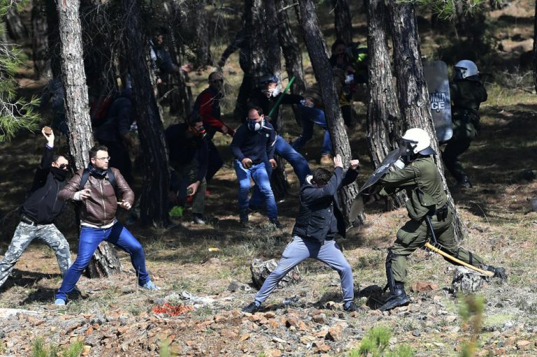 Multiple police injured in clashes with Greek island protesters as tear gas deployed