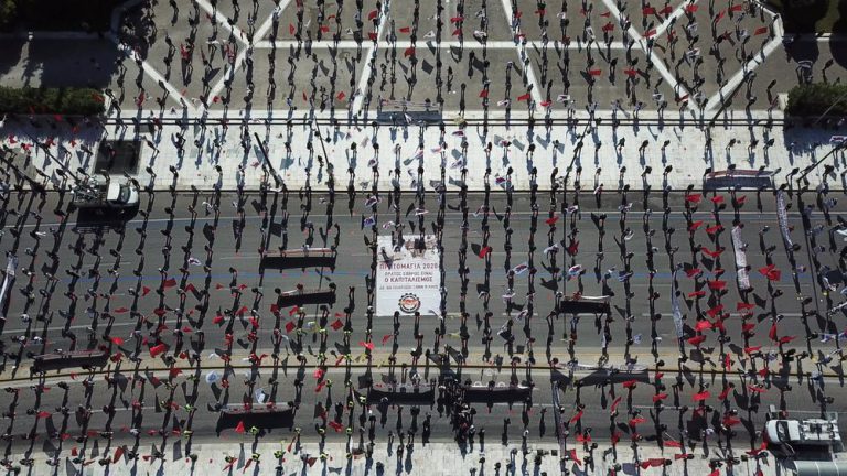 Greek workers defy ban with social distancing to mark Labour Day