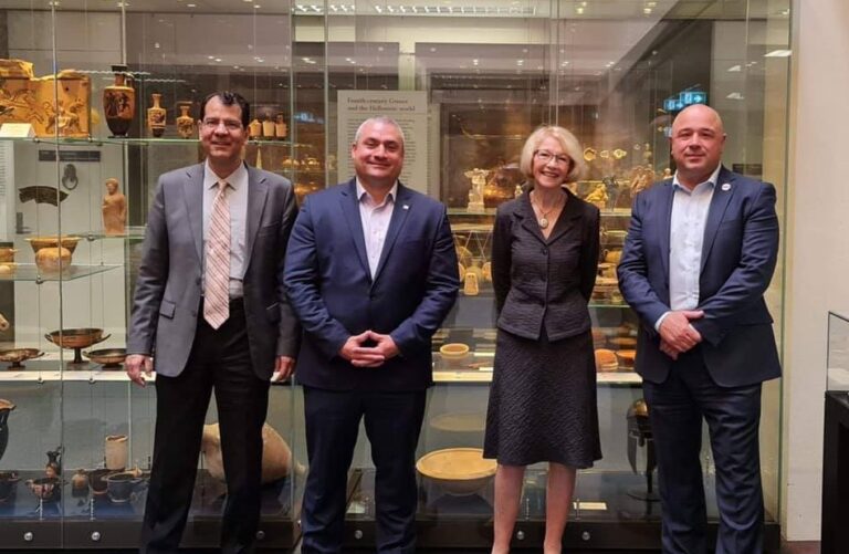 Ambassador of Greece, George Papacostas, admires Greek artefacts at Canberra museum