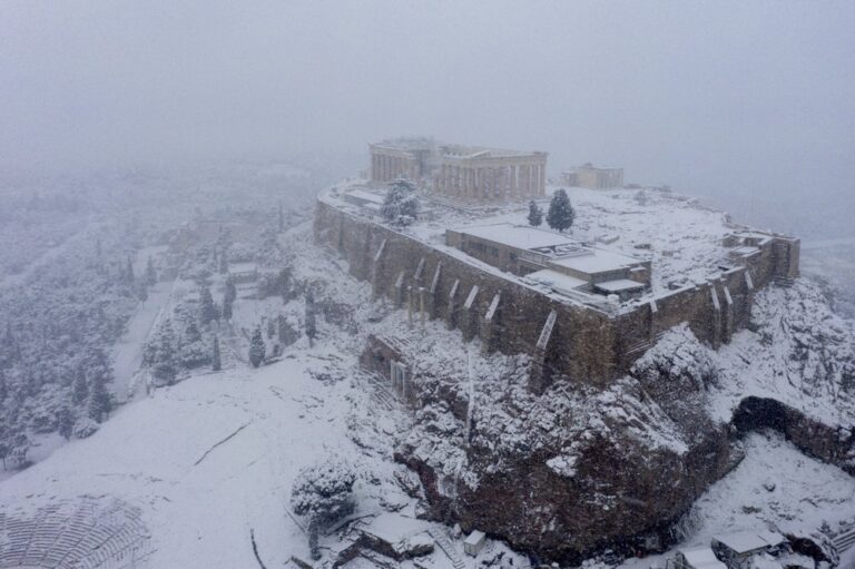 Two dead as rare snow snowfall blankets Greece, vaccinations halted in Greek capital
