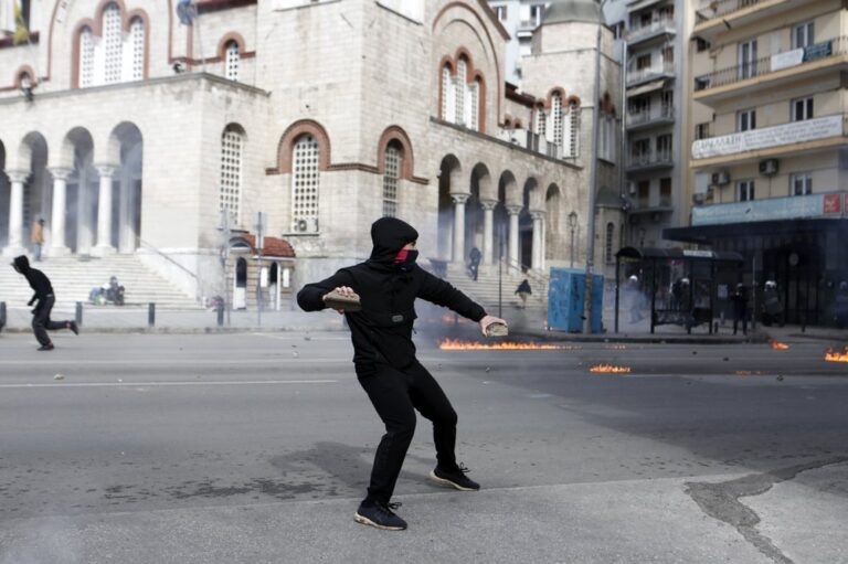Greek protesters attack police with firebombs at rally