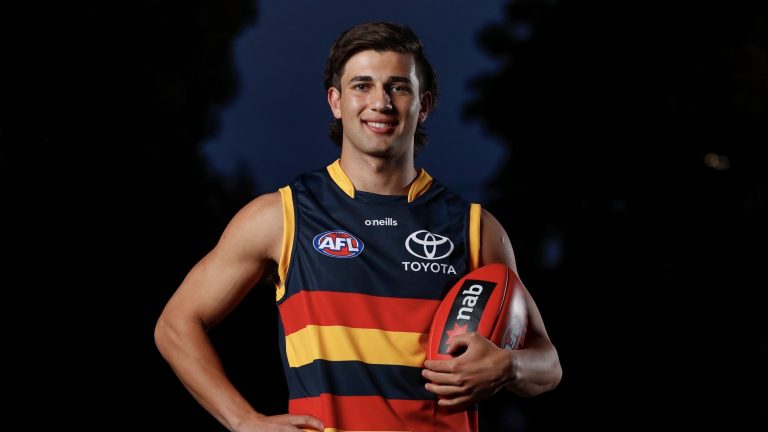 What led AFL footballer Josh Rachele to call the Adelaide Crows home