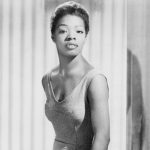 Maya Angelou (b. 1928), began her career as a dancer and writer. 1957 portrait dressed for her part in the Caribbean Calypso
