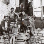 Josephine-Velelli-Becker-age-6-seated-behind-an-unnamed-young-girl-with-Greek-soldiers-before-Germany-occupied-Greece-during-World-War-II.-Family-photo