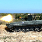 A-Kos-BMP-1-ZU-23-2-carrier-firing-during-military-exercises-in-2016.-The-vehicle-features-a-by-this-point-uncommon-unicolor-camouflage-scheme.-Source-bmpsvu.ru_