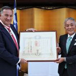 EOC-President-Spyros-Capralos-receiving-Order-of-the-Rising-Sun