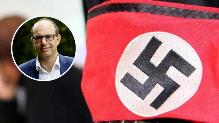 Family ties to Kalavryta Massacre behind Peter Poulos’ role in ban of Nazi symbols in NSW