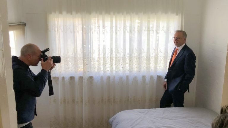 Louie Douvis photographs Australian PM as he revisits childhood home for first time