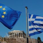 The EU and Greek flags near the Acropolis in Athens Photo Petr David Josek AP