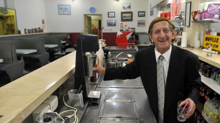 Johnny Adilinis: Tributes flow for owner of Golden Gate Cafe in coastal NSW