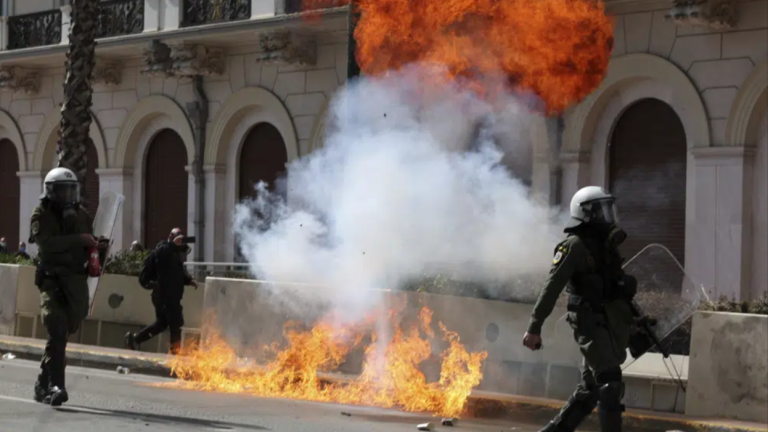 Greece’s PM apologises for deadly train crash as violence erupts at protests