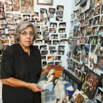 FEATURE-Katrina-Tsaftaropoulos-with-a-shrine-of-photographs-in-her-son-Georges-room.-Photo-by-Justin-Lloyd.
