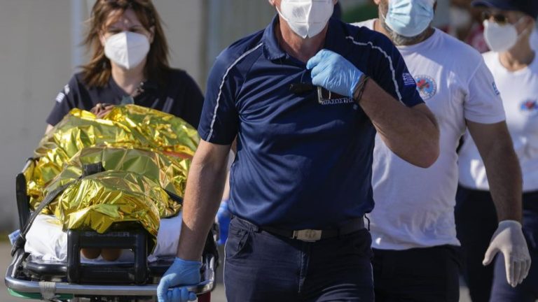 Nine survivors arrested as hopes dim for missing migrants from shipwreck off Greece