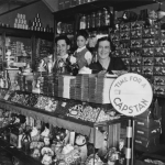 The Samios family taken in the Paragon Café in Dalby in 1936, epitomises the café phenomenon.