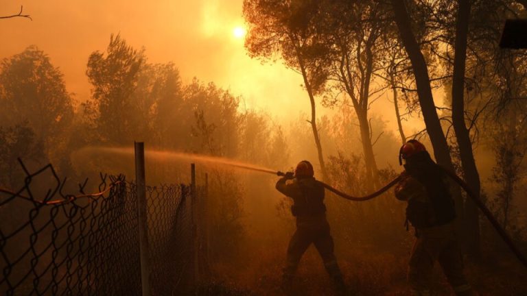 Strong winds rekindle wildfires in West Attica, Rhodes and Peloponnese