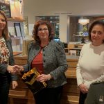 The exchange of gifts between the Cypriot representative and the community members.