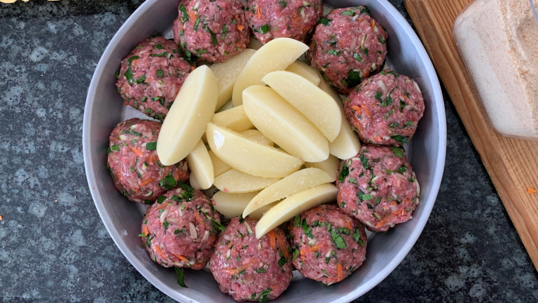 Traditional Greek recipes: Meatballs with crispy, oven potatoes
