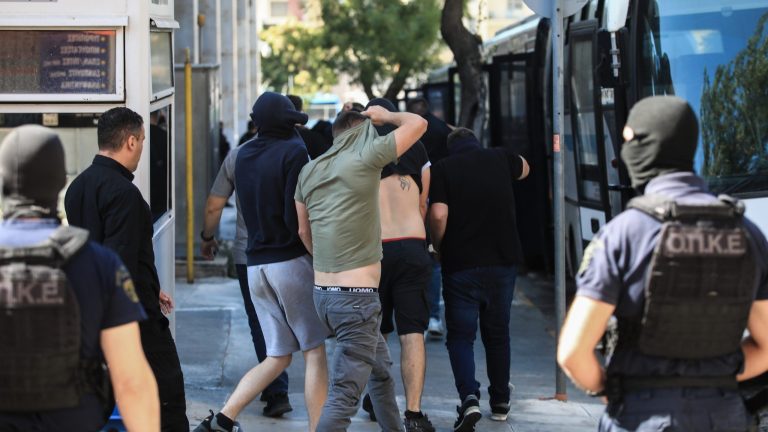 104 people charged after deadly football fan brawl in Greece