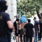 Over 100 people have been charged over the violent football brawl in Athens, Greece.