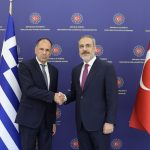 Foreign Minister Giorgos Gerapetritis (L) and Turkish counterpart, Hakan Fidan (R).