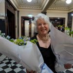 Cathy Alexopoulos holds bouquets by Vasette which weigh as much as babies.