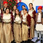 students dressed in traditional costumes