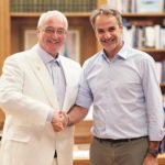 Thanasis Tsouhandaris (L) meets with Greek Prime Minister Kyriakos Mitsotakis (R).