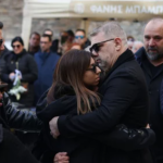 Karras’ daughter at her father’s funeral service. Photo iefimerida.