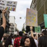 People raise placards as they participate in the annual Pride parade, in Athens, on June 10, 2023. Greece’s center-right government said on Thursday, Dec. 21 2023 it would fulfill a commitment to legalise same.