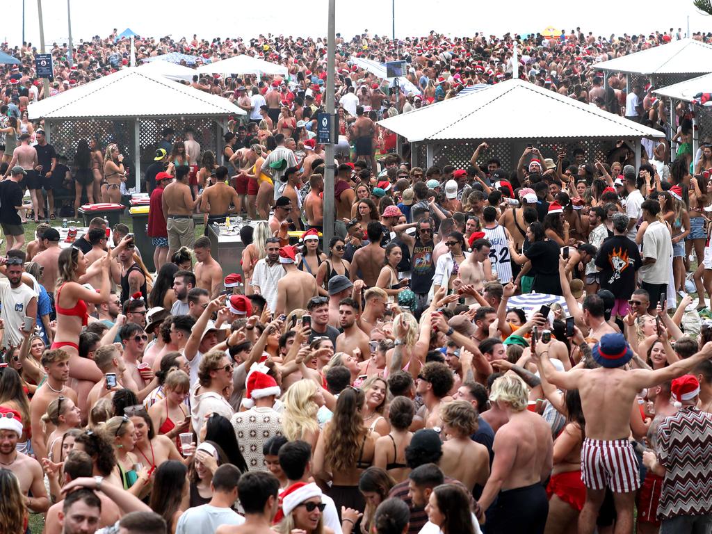 Thousands of predominantly backpackers and travellers celebrate Christmas Day at Bronte Beach this year. Jane Dempster.