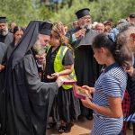 Archbishop-Makarios-offers-a-young-girl-her-icon-1