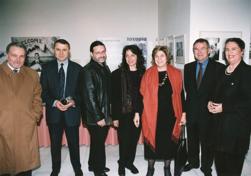 Exhibition launch at The Arts Centre, Eleftherias Park. Elizabeth Papazoe, former Greek Minister for Culture (in orange scarf) and Ross Burns, Australian Ambassador (second on the right). Leonard and Effy (centre).