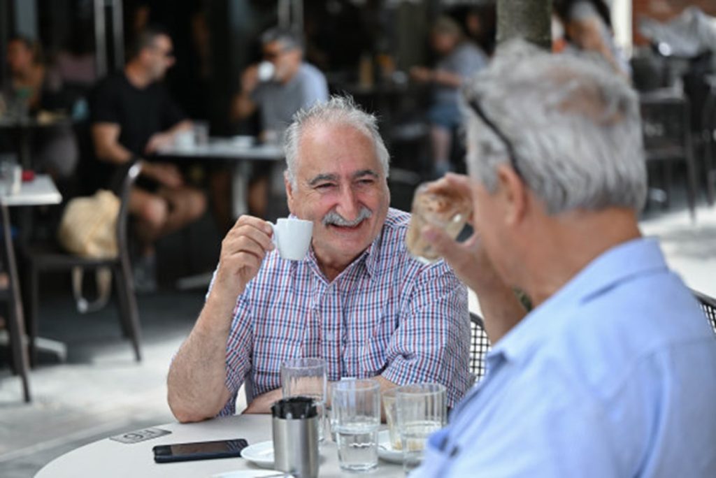 Gregory Liakatos with lifelong friend James Kaloumeris enjoying Greek coffee in Oakleigh. Photo The Age.