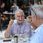 Gregory Liakatos with lifelong friend James Kaloumeris enjoying Greek coffee in Oakleigh. Photo The Age.