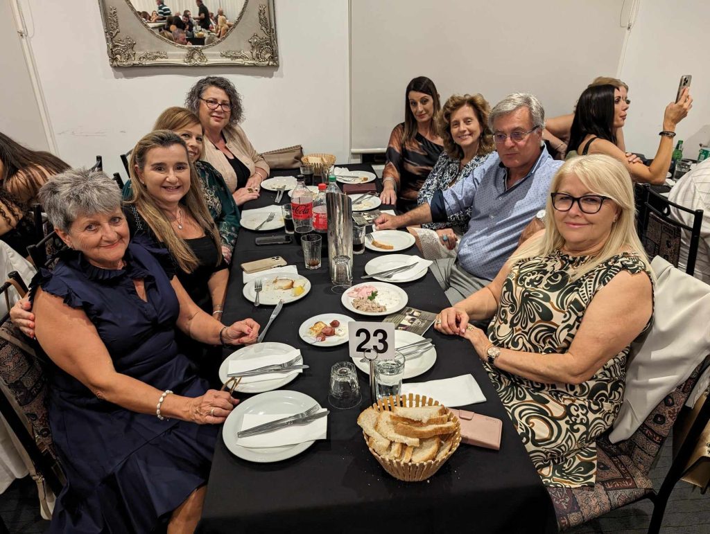 Litsa Athanasiadis Roma Siachos Katy Karabatsos and their table.