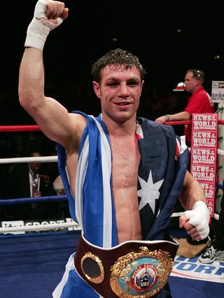 Michael Katsidis celebrates after defeating Graham Earl in their Interim WBO Lightweight Championship of the World boxing bout at the Wembley Arena, London, 17 Feb 2007. Photo Courier Mail.