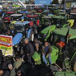 Protesting farmers with their tractors take part in a rally outside an agricultural fair in the port city of Thessaloniki, northern Greece, Thursday, Feb. 1, 2024. Photo Giannis Papanikos AP News.