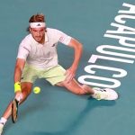 Stefanos Tsitsipas hits a forehand to Laslo Djere at the Mexican Open tennis tournament in Acapulco, Mexico. Photo New Indian Express.