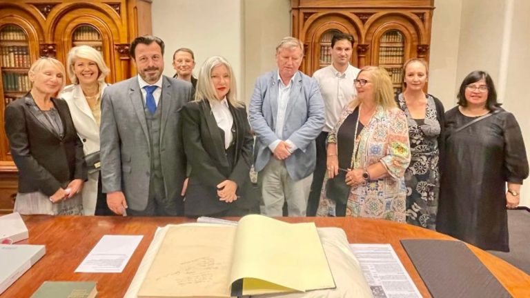 A tale of two men and a book donation: A community rediscovers its past