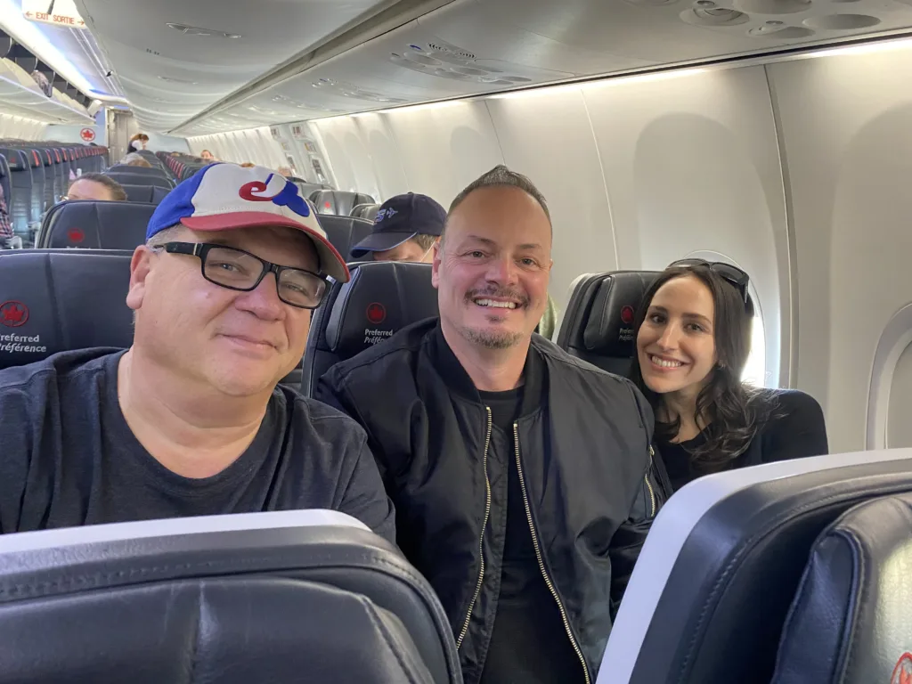 Angelo Tsarouchas on plane with Frank Spadone and Arianna Papalexopoulos.