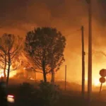 Fires fanned by gale-force winds raged through pine forests and seaside settlements in Mati. Photo ABC NEWS