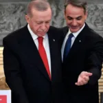 Greece’s Prime Minister Kyriakos Mitsotakis, right, and Turkey’s President Recep Tayyip Erdogan leave after their statements at Maximos Mansion in Athens, Greece. Delegations from Greece and Turkey were meeting in Athens,
