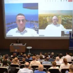 Stratos Chalkiadakis, Senior Residential Sales Operations Manager at LAMDA Development S.A. and Andreas Kambanellas, Commercial Director Residential at LAMDA Development S.A., present The Ellinikon via video call.