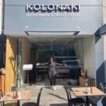 ‘Kolonaki: Athenian Street Food’, 278 Toorak Road, South Yarra – Manageress Britney Liu embracing her new Greek restaurant, with Asian cuisine restaurants on each side.)