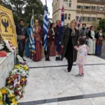 Sophia Siachos lays a wreath her her daughter, Olympia
