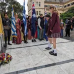 Students from Oakleigh Grammar lay a wreath