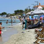 Deckchairs and sunbeds taking off almost all of a beach on the Halkidiki peninsula in northern Greece. Photo The Australian.