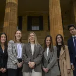 Rising star graduate lawyers, Maddison Lloyd, Shannon Cain, Kahlia Steinert, Kristen Camera, Claudia Van Eckeren and Chris Michalakas outside Adelaide Magistrates court. Picture: RoyVPhotography