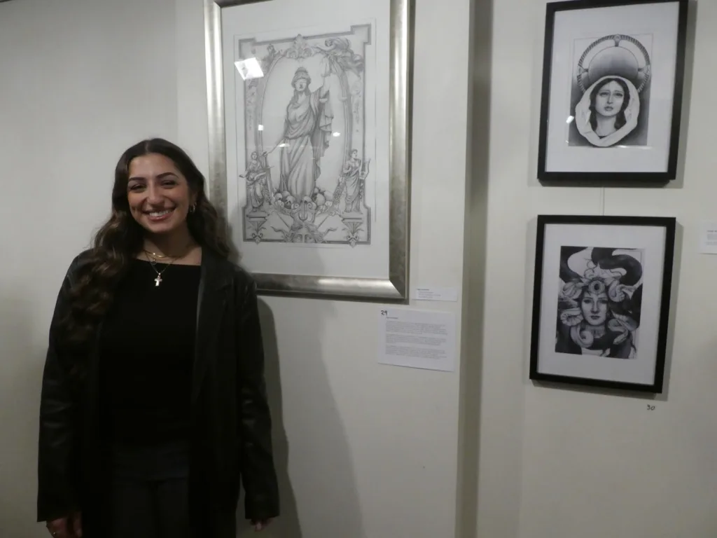 Olga Antoniadis with her drawings